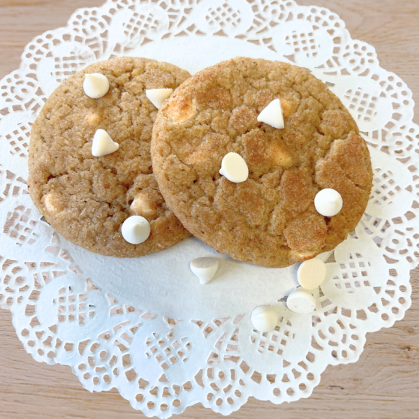 Two white chocolate chip gourmet pumpkin spice cookies