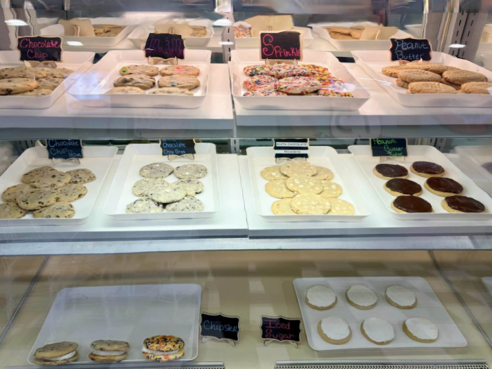 Assorted cookies displayed in a bakery case