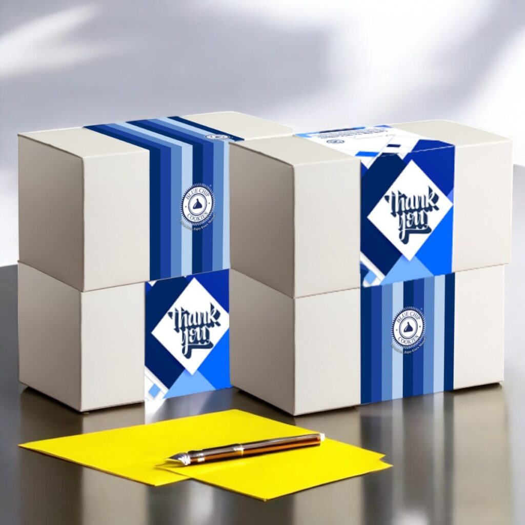 Stacked 'Thank You' gift boxes with pen and yellow card