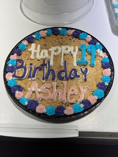 Decorative cookie cake with Happy 19th Birthday Ashley message