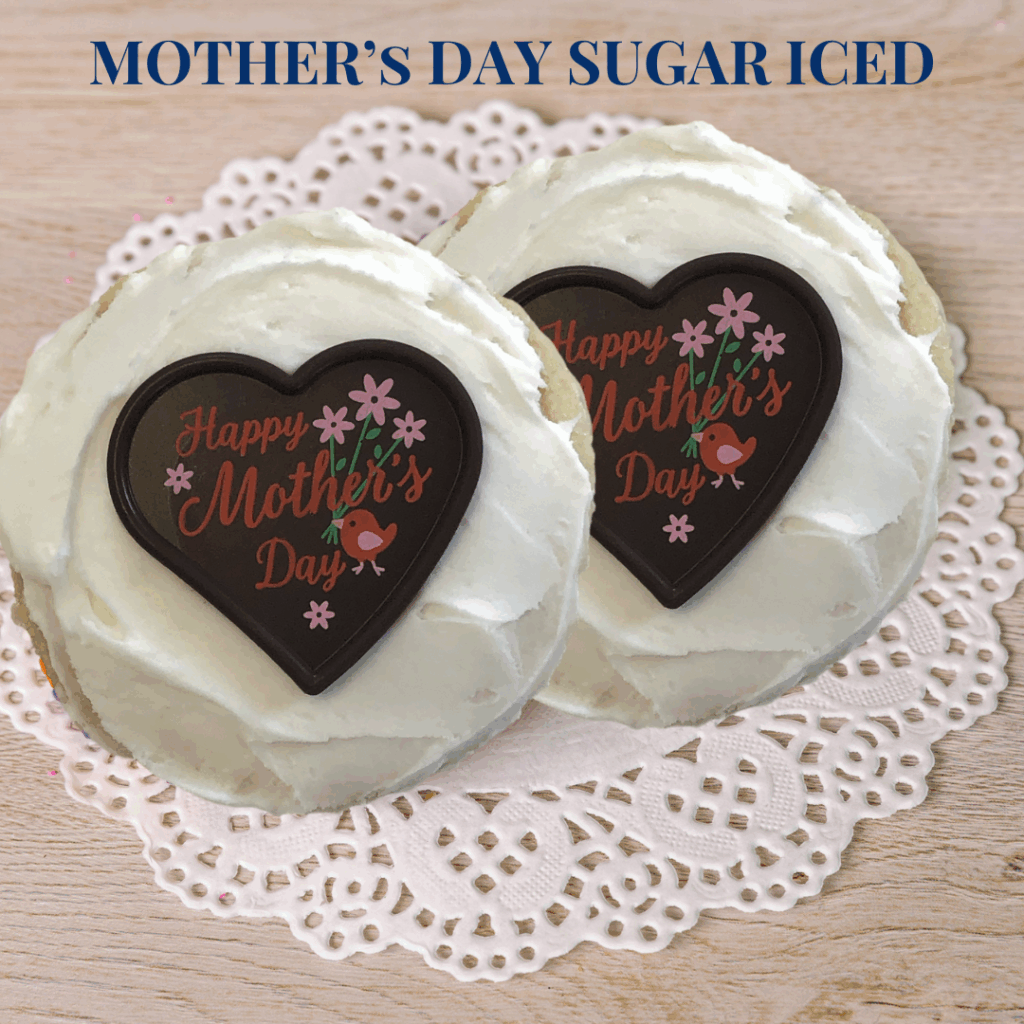Mother's Day themed cupcakes with heart-shaped decorations