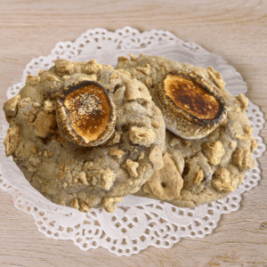 Marshmallow topped cookies on lace doily