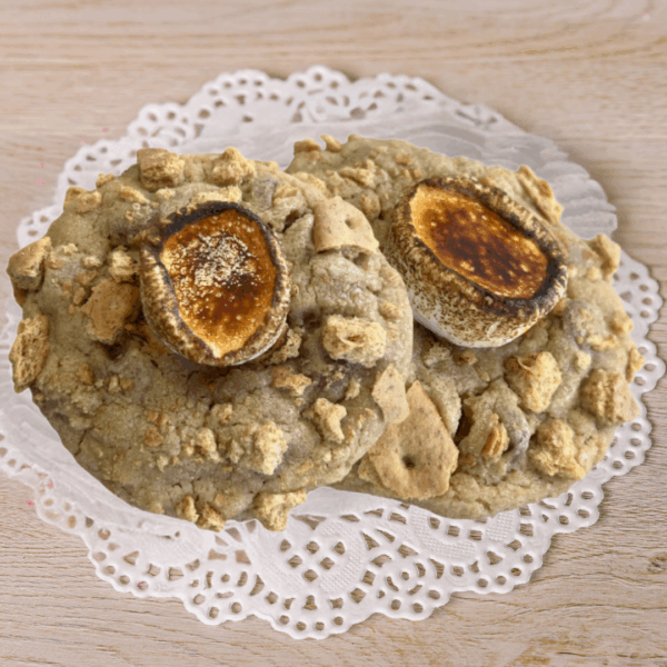 Marshmallow topped cookies on lace doily